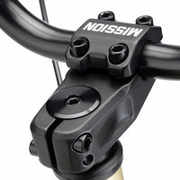 Close up of Mission Control top load stem built up on a desert gold Kink Curb BMX bike