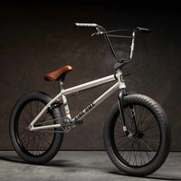 Kink Gap 20 inch BMX bike in Terrazzo White photographed at a 45 degree angle in an industrial warehouse