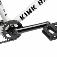 Close up of drive chain on Kink Gap BMX bike in Terrazzo White, photo shows Mission Breach 25 tooth sprocket, Kink Ridge Chromoly 3 piece cranks and Kink Hemlock plastic pedal