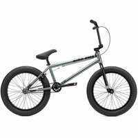 Side view of Kink Whip XL 20 inch BMX bike in slate grey photographed on a white background
