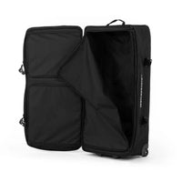 Black suitcase with open compartment on a white background