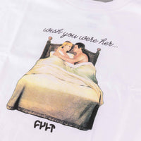 Illustration of a couple in bed with text 'wish you were her' on a white background