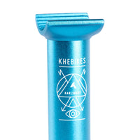Close up photo of the KHE laser etched logo on the top of a KHE blue anodised pivotal seat post