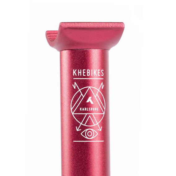 Close up photo of the top of a KHE red anodised pivotal seat post