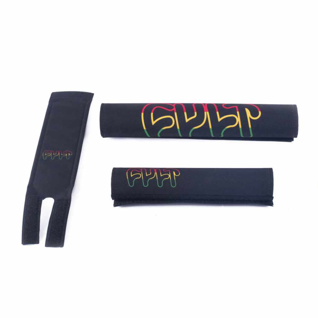 Cult frame, bars and stem padset in black with a printed CULT logo in Rasta colours