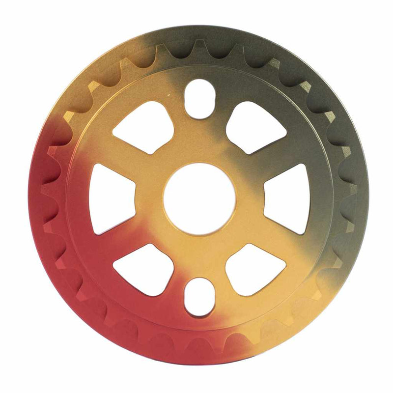 Rear view of Cult Dak Guard sprocket in anodised Rasta colourway on white background