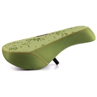 Green bicycle seat with pattern on a white background