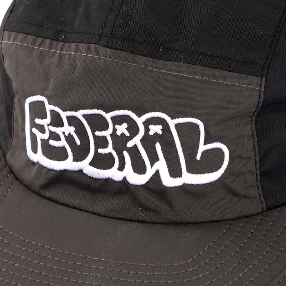 Black cap with 'Federal' logo on a dark background