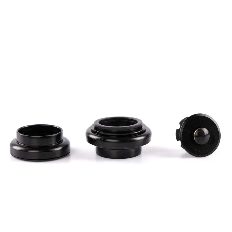 Three black cylindrical objects on a white background