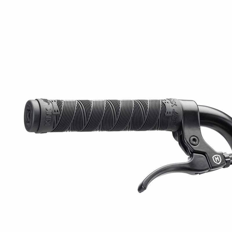 Kink ACE flangeless right hand grip in black with black Mission Token lever built on to a Kink Curb BMX bike