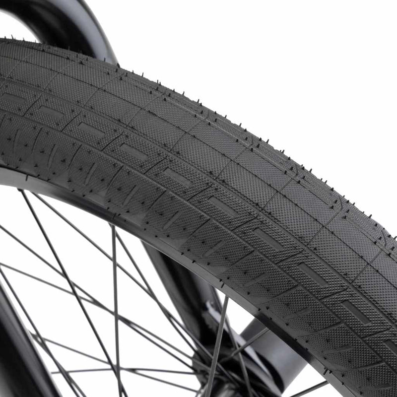 Close up of Kink Wake 20" tyre on a Kink Downside BMX bike