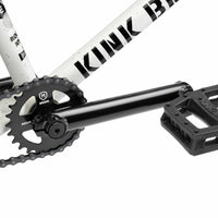 Close up of drive chain on Kink Gap XL BMX bike in Terrazzo White, photo shows Mission Breach 25 tooth sprocket, Kink Ridge Chromoly 3 piece cranks and Kink Hemlock plastic pedal