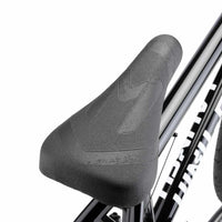 Close up of Mission Warsaw Combo seat on marble black Kink Launch BMX bike