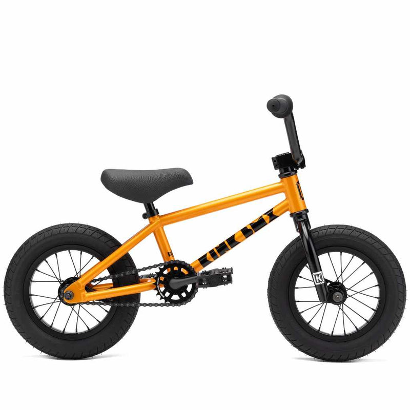 Kink 12" BMX Roaster orange complete bike in orange, side view photographed on a white background