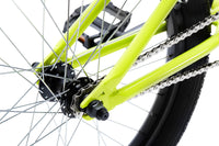 Tribal Trap Neon Yelow BMX rear hub and dropout on a white background