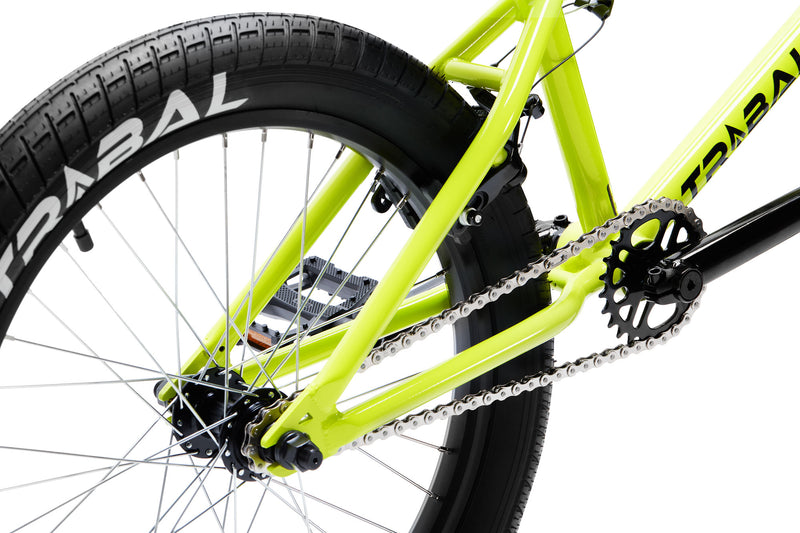 Tribal Trap Neon Yellow BMX rear wheel and back end of bike on a white background