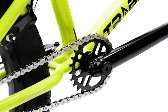 Tribal Trap Neon Yellow BMX sprocket and crank on a white background