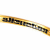 Close up of a Gold Alienation TCS Felon rim showing the Alienation graphic photographed on a white background.