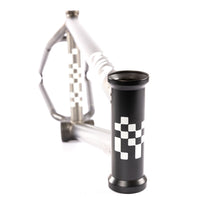 Bicycle frame with black checkered decal on a white background