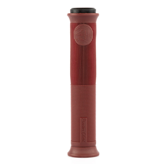 Red bicycle handlebar grip with a black end on a white background