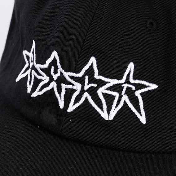 Black cap with white star designs on a plain background