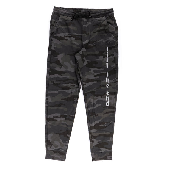 Camouflage pants with text on a white background