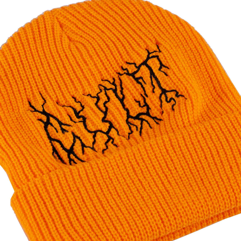 Close up of  embroidered Cult Metal logo in black on an orange beanie