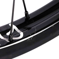 Close-up of a bicycle rim with a hub on a white background