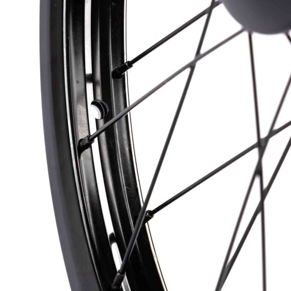 Close-up of a cult bmx match v2 rim  and spokes on a white background