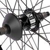 Close-up of a cult bmx freecoaster hub with visible branding on a white background