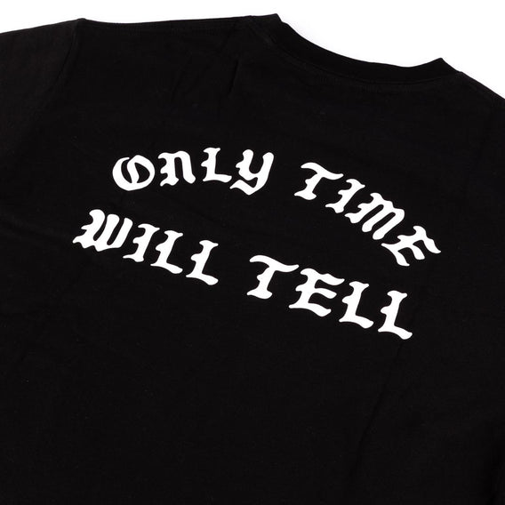 Black t-shirt with white text 'ONLY TIME WILL TELL' on a plain background