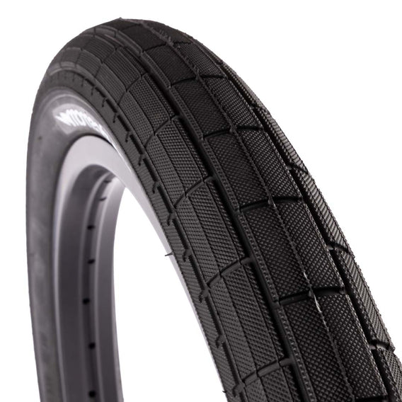 demolition momentum black bmx tyre  close up