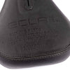 Close-up of a bicycle seat with 'Eclat' branding on a white background