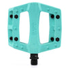 Turquoise Teal Eclat Contra BMX pedal with black pins on a white background