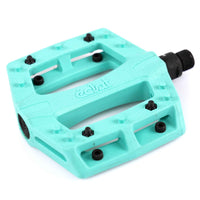 Turquoise Teal Eclat Contra BMX pedal with black pins on a white background