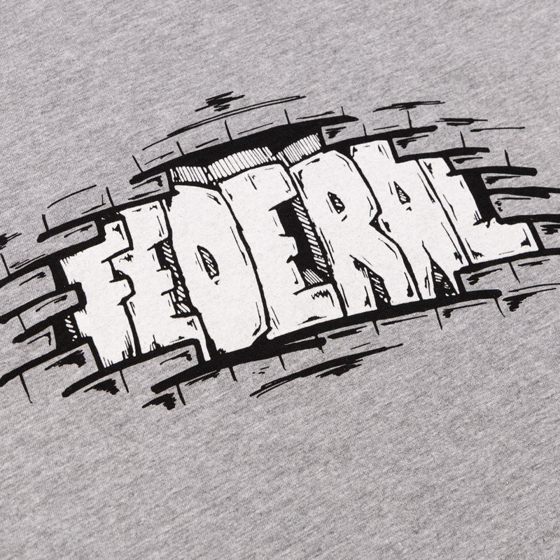 Close up photo of the black and white print on the Federal Bricks t-shirt
