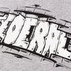 Close up photo showing the logo printed on the heather grey Federal Bricks t-shirt