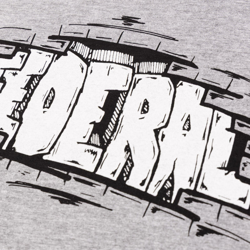 Close up photo showing the logo printed on the heather grey Federal Bricks t-shirt