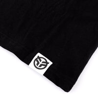 Close up of the Federal embroidered tag logo that is sewn onto the hem of the t-shirt
