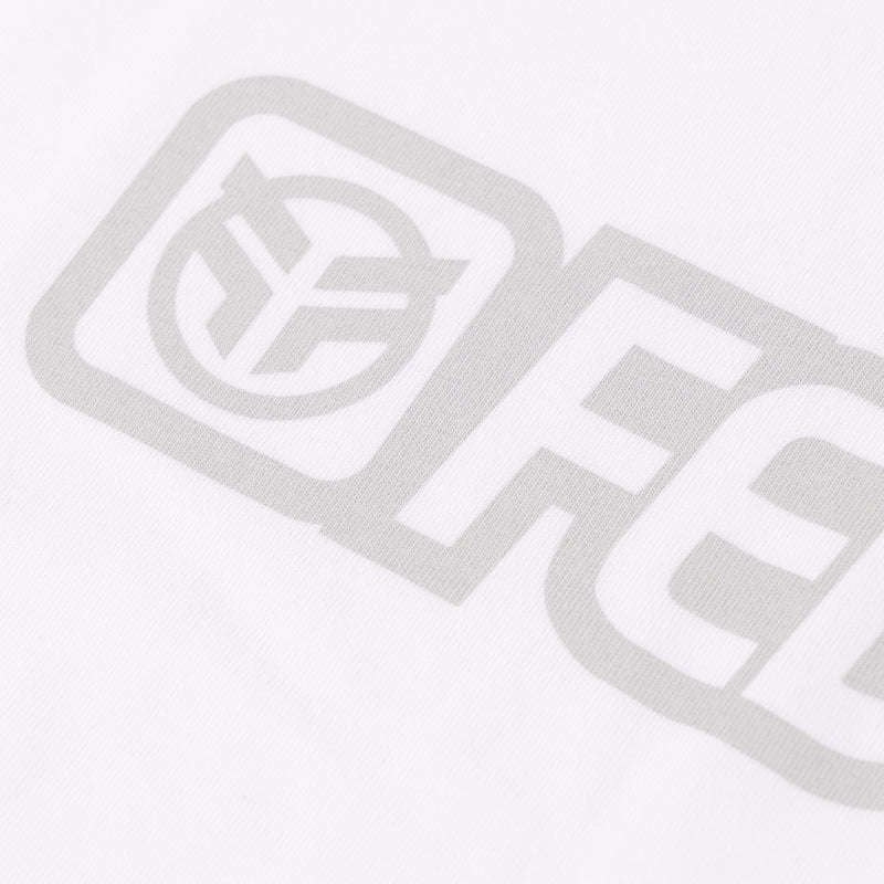 Close up photo of the grey screen printed logo on the Federal Outline white t-shirt