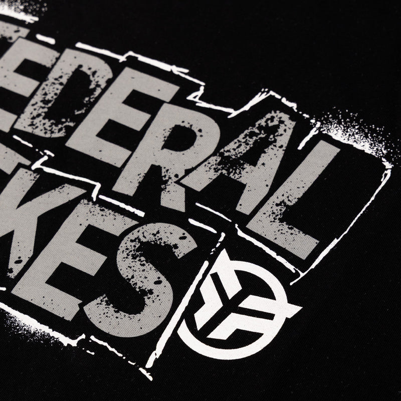 Close up of the printed design on the Federal Stencil t-shirt