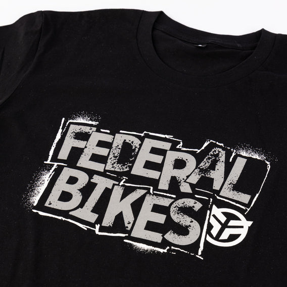 Close up photo of the Federal Stencil t-shirt print and neck of the t-shirt