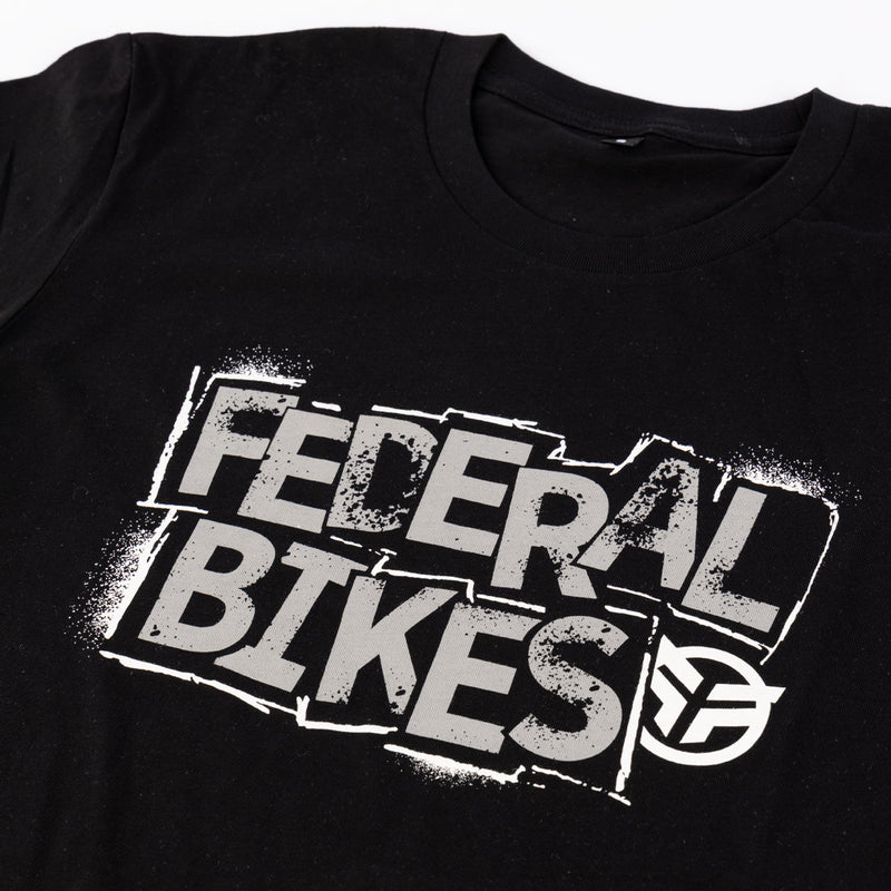 Close up photo of the Federal Stencil t-shirt print and neck of the t-shirt
