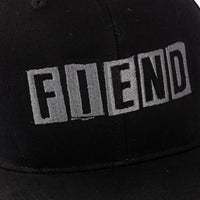 Black cap with 'FIEND' text on a black background