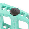 Teal odyssey bmx pedal with 'twisted' odyssey bmx pedal end cap