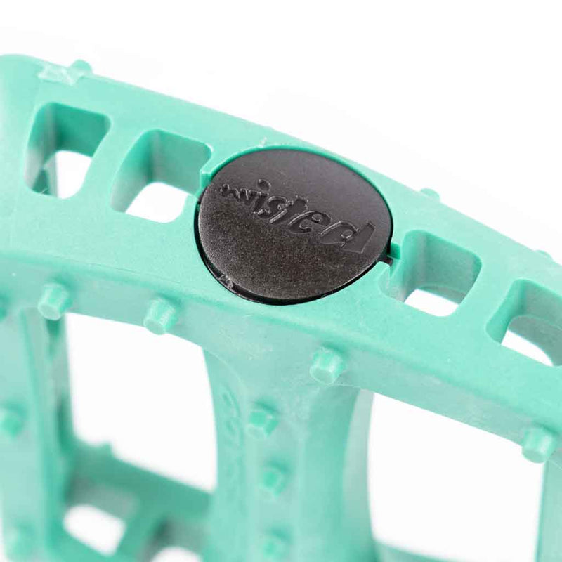 Teal odyssey bmx pedal with 'twisted' odyssey bmx pedal end cap
