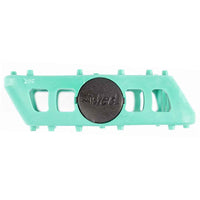 teal plastic bmx pedal with a black circular logo on a white background