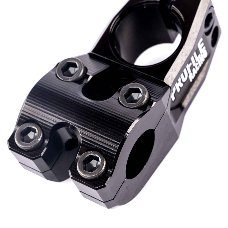 Top view of Profile Push stem in black photographed on a white background