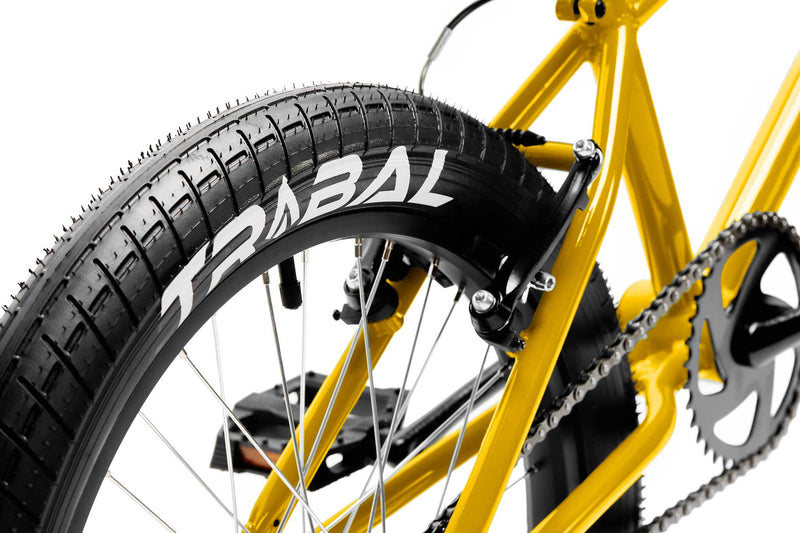 Tribal Clan V2 yellow close up of rear tyre and brake photographed on a white background