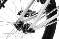 Tribal Spear Silver BMX, close up of rear hub on a white background